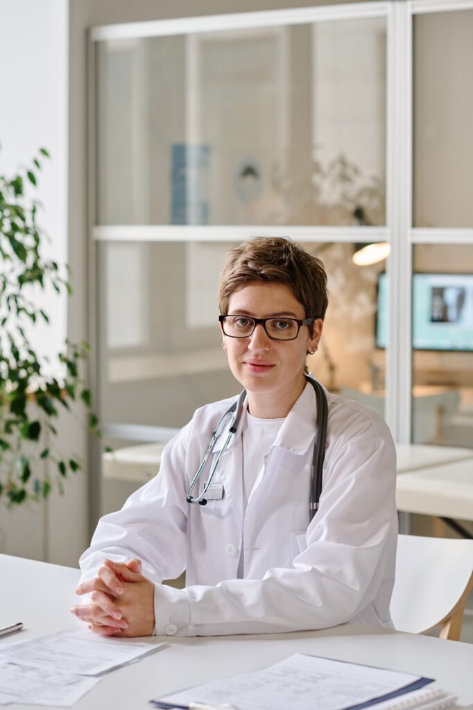 Female doctor sitting at her workplace